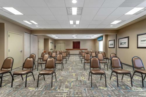 a conference room with chairs and a podium at Hampton Inn & Suites Minneapolis St. Paul Airport - Mall of America in Bloomington