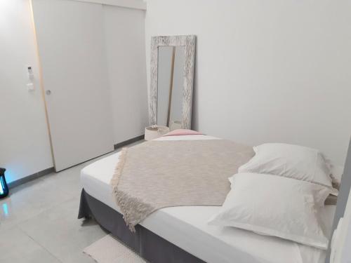 Postel nebo postele na pokoji v ubytování Appartement Fleur De Lys