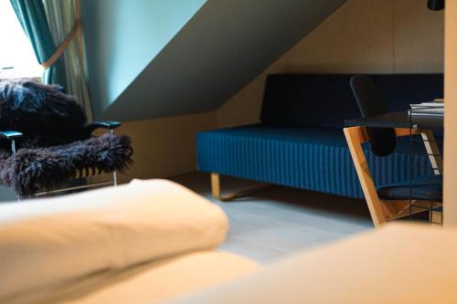 Postel nebo postele na pokoji v ubytování Hotel Aak