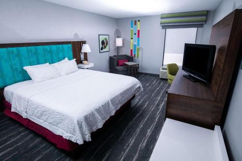 Ένα ή περισσότερα κρεβάτια σε δωμάτιο στο Hampton Inn Pickwick Dam-At Shiloh Falls