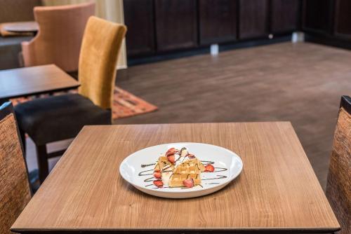 a plate sitting on top of a table at Hampton Inn Parkersburg/Mineral Wells in Mineralwells