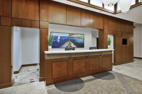 a lobby with a reception desk in a building at Hilton Garden Inn Portland Downtown Waterfront in Portland