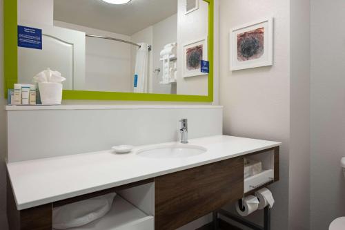 a bathroom with a sink and a mirror at Hampton Inn Richfield in Richfield
