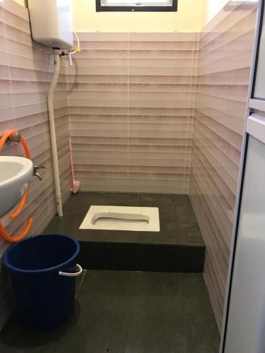 Ένα μπάνιο στο Homestay Dalilah Islam Sendayan