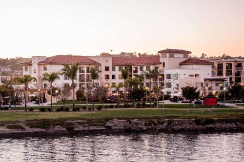 a group of buildings next to a body of water at Homewood Suites by Hilton San Diego Airport-Liberty Station in San Diego