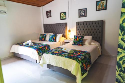 Postel nebo postele na pokoji v ubytování Villeta Resort Hotel