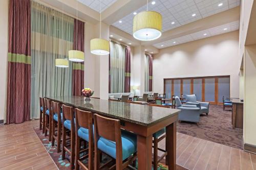 a conference room with a large table and chairs at Hampton Inn & Suites Shreveport/Bossier City at Airline Drive in Bossier City
