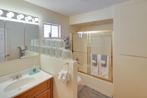 a bathroom with a sink and a shower and a toilet at Dog-Friendly Bullhead City Home - Walk to Beach! in Bullhead City