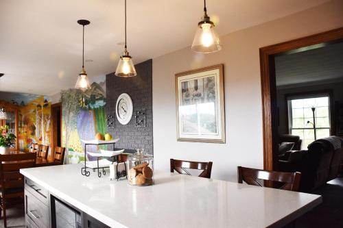 a kitchen with a white counter top in a room at As You Like It Bed and Breakfast in Niagara-on-the-Lake