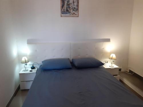 Postel nebo postele na pokoji v ubytování casa mare