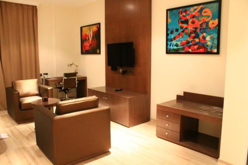 Televisyen dan/atau pusat hiburan di Rawda Hotel