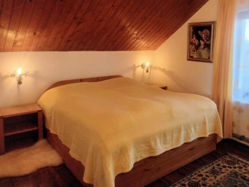 En eller flere senge i et værelse på Boutique apartment 80 sqm