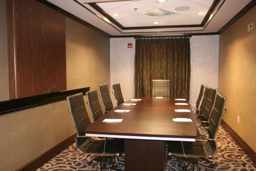 a conference room with a long table and chairs at Hampton Inn New Albany in New Albany