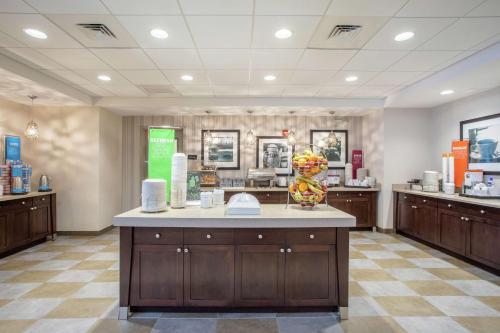 a store with a counter in the middle of a room at Hampton Inn Philadelphia/Voorhees in Voorhees