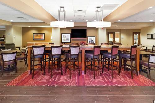 a conference room with a large table and chairs at Hampton Inn Waynesburg in Waynesburg