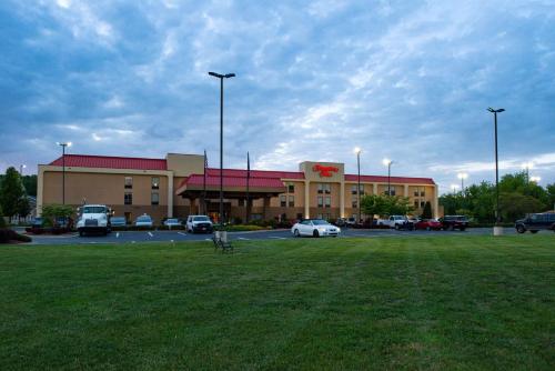 a large building with cars parked in a parking lot at Hampton Inn Wytheville in Wytheville