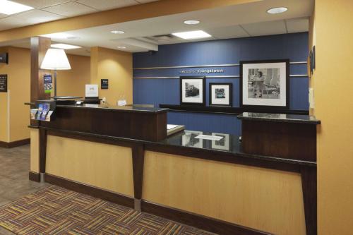 a waiting area of a hospital with a reception counter at Hampton Inn Youngstown-North in Youngstown