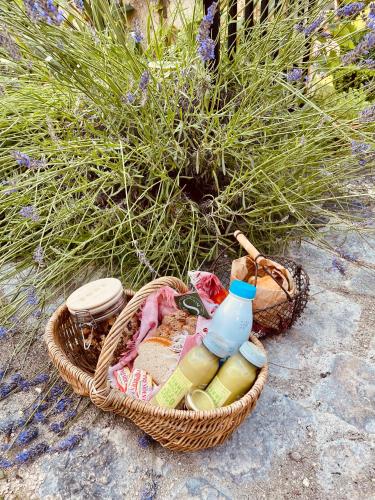 a picnic basket with a bottle of water and other items at Belle Fontaine in Bourges