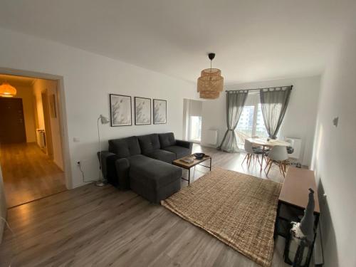 Χώρος καθιστικού στο Cozy Place to Remember – with fireplace & Netflix