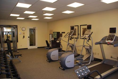 a gym with several exercise equipment in a room at Hilton Garden Inn Birmingham/Trussville in Trussville