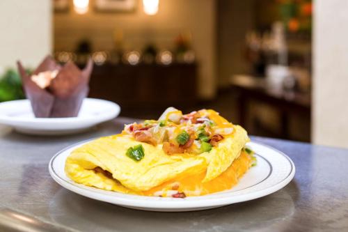 a plate with a omelet on a table at DoubleTree by Hilton Boston-Milford in Milford