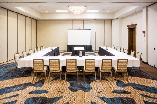 a conference room with a large table and chairs at DoubleTree by Hilton Boston-Milford in Milford