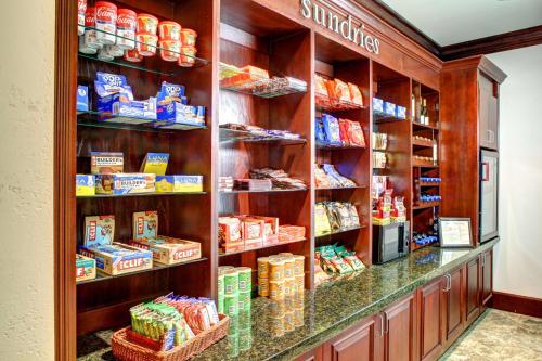 a grocery store aisle with shelves of food at Hilton Columbia Center in Columbia