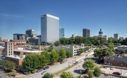 an aerial view of a city with tall buildings at Hilton Columbia Center in Columbia