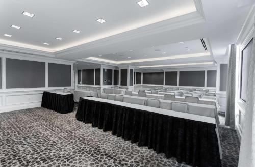 a large room with rows of chairs and tables at Hilton Columbus at Easton in Columbus