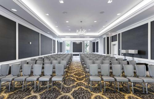a conference room with chairs and a podium in it at Hilton Columbus at Easton in Columbus