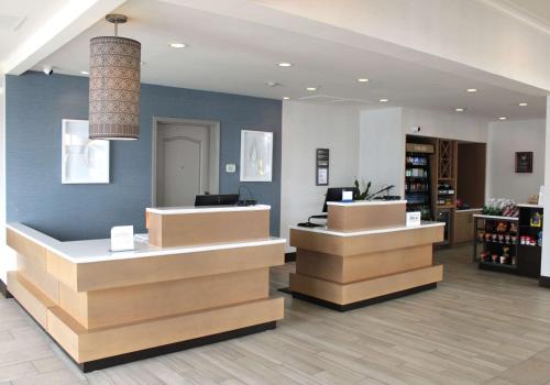 a store with two checkout counters in a pharmacy at Hilton Garden Inn Colorado Springs Airport in Colorado Springs