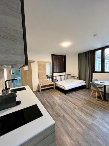 Postel nebo postele na pokoji v ubytování NB Apartments