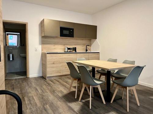 Kuchyň nebo kuchyňský kout v ubytování NB Apartments