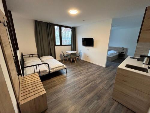 TV a/nebo společenská místnost v ubytování NB Apartments