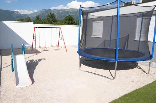 a group of trampols in a playground at Vila Nur Mostar in Mostar