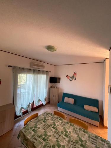 Ένα ή περισσότερα κρεβάτια σε δωμάτιο στο Veliero House