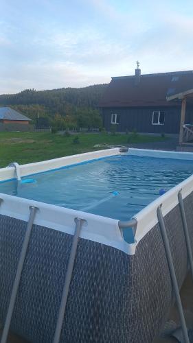 a large swimming pool sitting on top of a chair at Rancho Resort in Bilichi