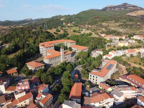 an aerial view of a small town with buildings at Il Portico Rosa in Cuglieri