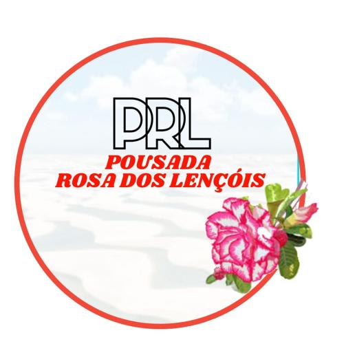 una foto di un cartello rotondo con un fiore rosa di POUSADA ROSA DOS LENÇÓIS a Barreirinhas