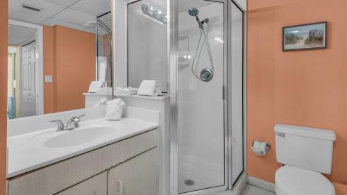 a bathroom with a sink and a shower at Long Beach Tower 1 800E in Panama City Beach