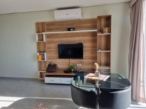 TV a/nebo společenská místnost v ubytování Apartamento en Asunción