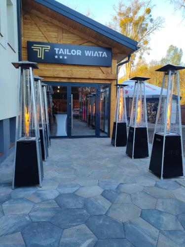 a store with a sign that reads tellor watch at Tailor Hotel Sport & Conference in Morąg