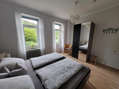 Postel nebo postele na pokoji v ubytování Ferienhaus im Moseltal