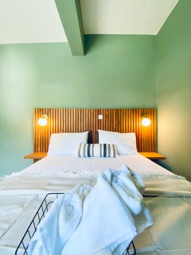 Кровать или кровати в номере Lord Ape Suites Club