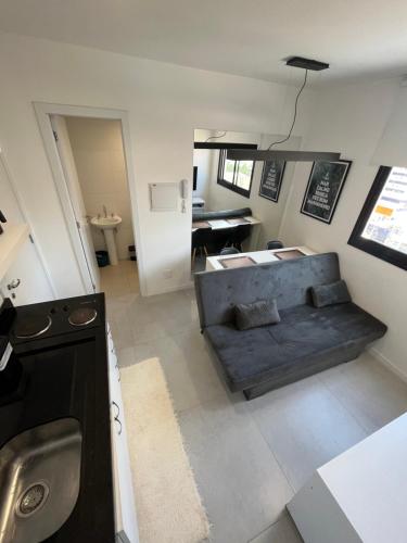 Dapur atau dapur kecil di Studio inteiro ótima localização centro