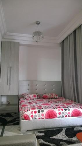 Llit o llits en una habitació de Résidence Ghozlane