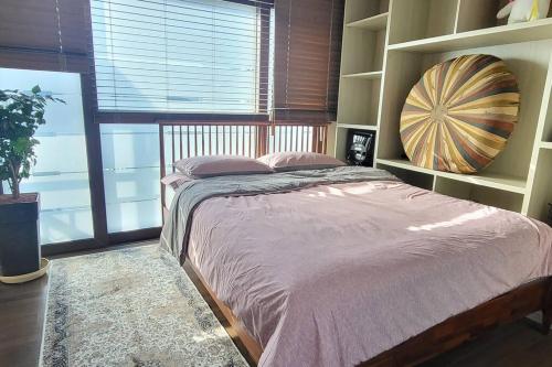 Tempat tidur dalam kamar di Harmony Fill Pension