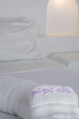 Ένα ή περισσότερα κρεβάτια σε δωμάτιο στο Nama Villas 