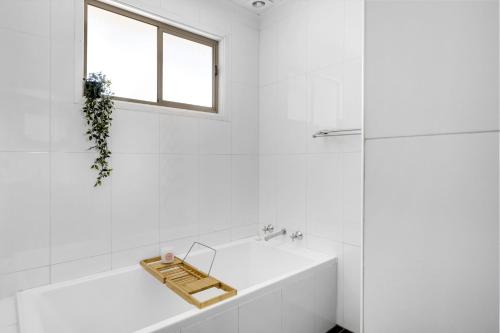 Koupelna v ubytování Corinya Cottage By Experience Jervis Bay