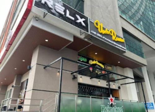 a building with a sign on the side of it at 【NEW】Modern Comfort Studio@Juru Sentral Icon City in Bukit Mertajam